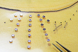 Placing crystals on the transfer sheet
